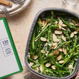 Blue Apron; a tray of Blue Apron Family Style green beans against a natural background