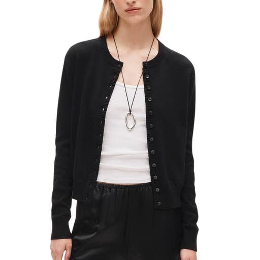 A woman wearing J.Crew Perfect Cashmere Cardigan against a white background