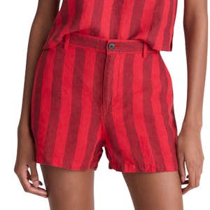 Madewell; a woman wearing red striped Madewell The Zoe Short in 100% Linen against a white background