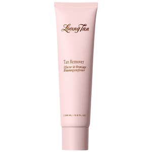 pink loving tan deluxe tan remover tube on white background