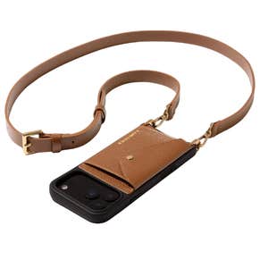 Bandolier; Hailey Crossbody Phone Case in Saddle Brown/Gold against a white background