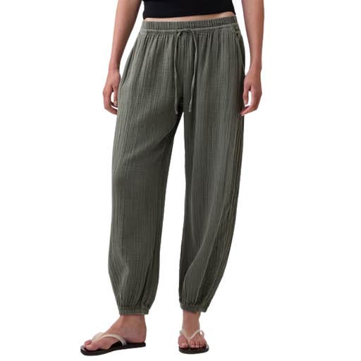 GAP; the bottom half of a woman wearing GAP Cotton Gauze Easy Joggers against a white background