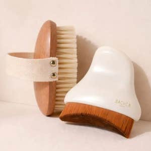 BACHCA; both a lymphatic face brush and lymphatic body brush against a neutral background