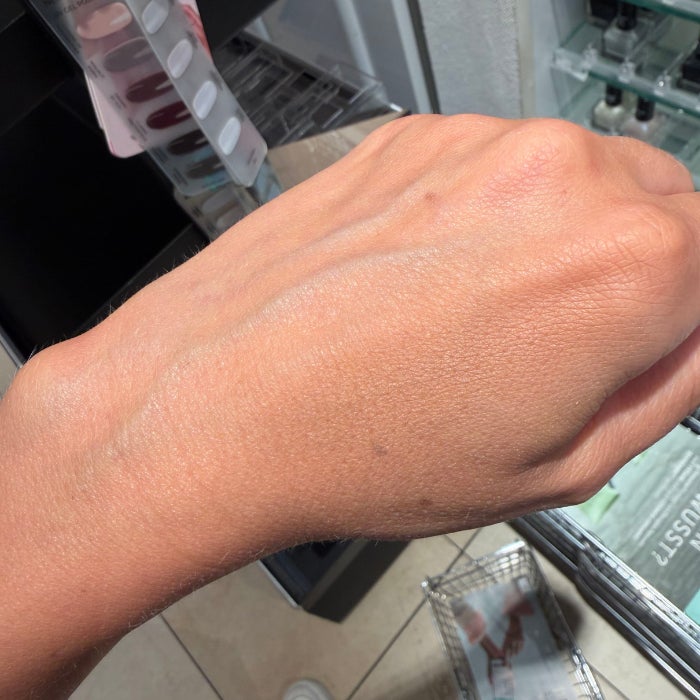 The back of a hand against a natural background