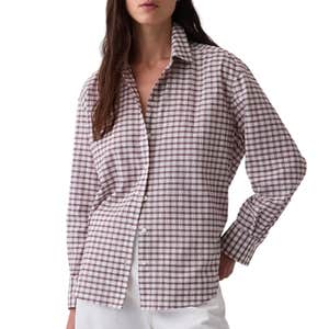 Gap; a woman wearing Gap Seersucker Plaid Oversized Shirt