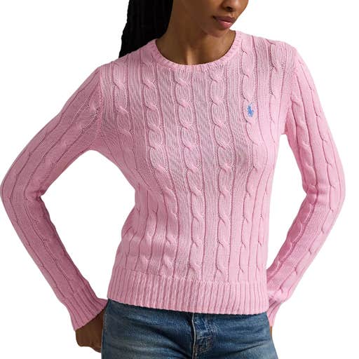 A woman wearing Polo Ralph Lauren Women's Cable Sweater against a white background