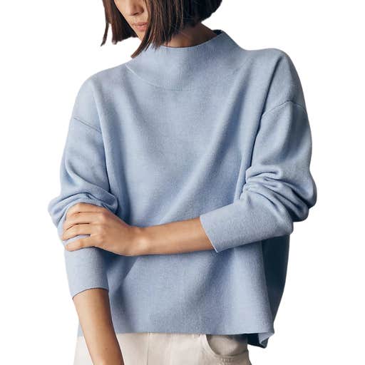 a woman wearing Maeve Carys Mock-Neck Sweater against a white background