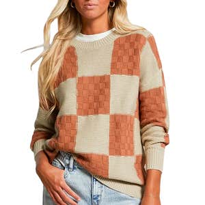 Buckle; a woman wearing BKE Checkered Knit Sweater