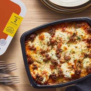 Blue Apron; a tray of family style lasagna against a natural background