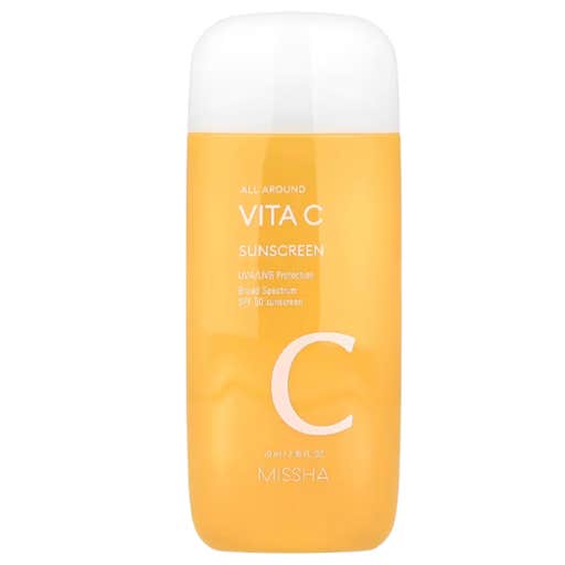 An orange bottle with a white cap of Missha All Around Vita C Sunscreen SPF 50 against a white background