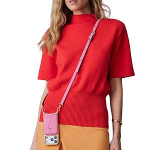 Bandolier; Donna Crossbody Phone Case in Flamingo Pink/Chrome Gold against a white backgound