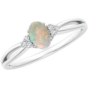 Angara, Angara Solitaire Oval Opal Split Shank Ring with Trio Diamonds