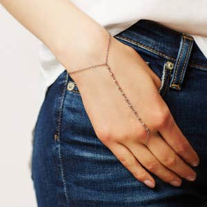 anthropologie.com, Eriness Rosegold Pearl Hand Chain